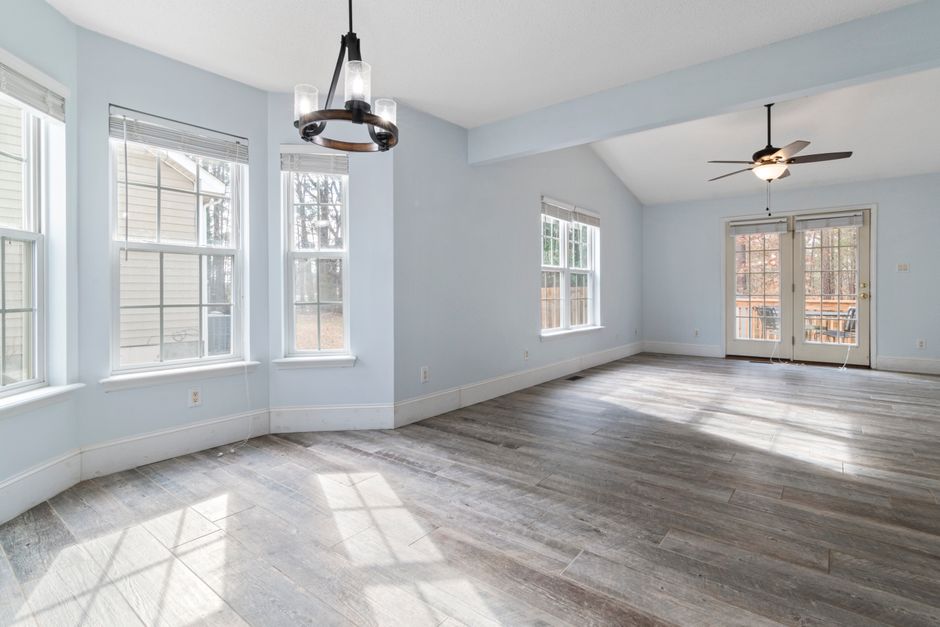 Newly installed hardwood flooring in a bright living room